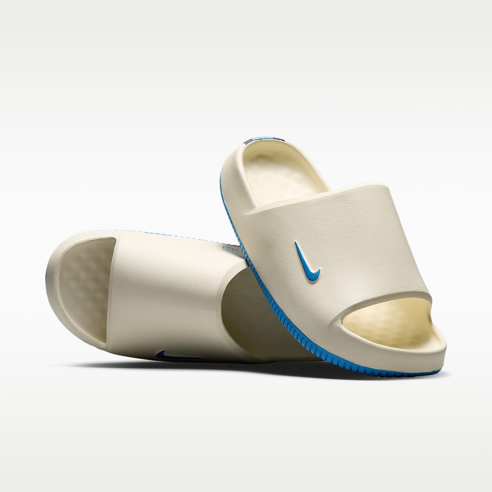 Nike Calm (Tennessee Titans) Men's NFL Slides. Nike.com